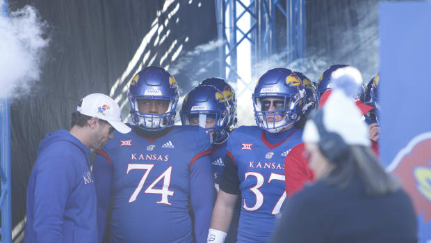 The Kansas Jayhawks prepare to take the field against the Texas Longhorns  in David Booth Kansas Memorial Stadium on November 19, 2022.